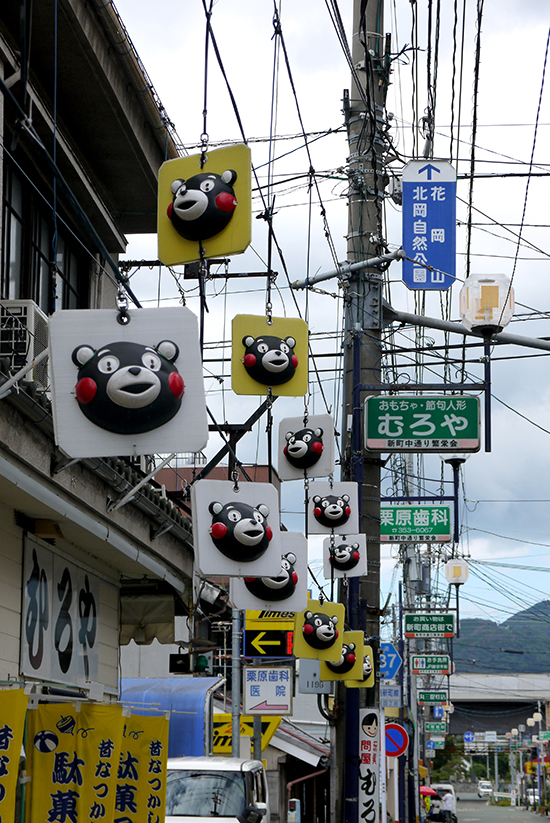 Kumamoto, mascot Kumamon hanging in the street